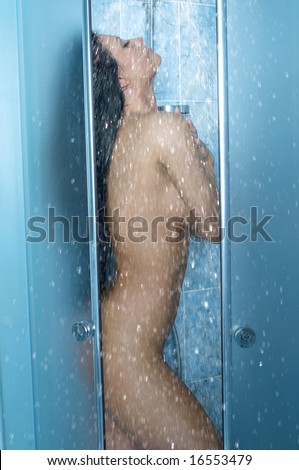 stock photo very beautiful and sexy girl taking a shower with open glass