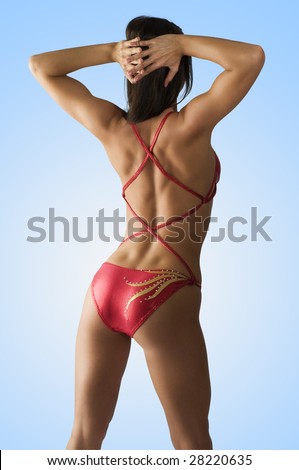 sexy girl in red costume showing her back side muscle