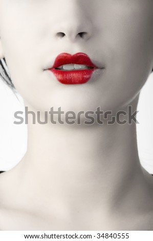 stock photo desaturated color portrait of woman with classic red japanese