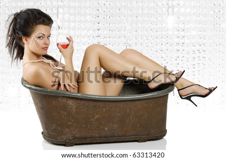 stock photo sexy shot of beautiful naked girl sitting in an old fashion