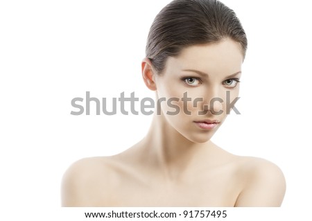 Beauty style portrait of young woman with healthy skin and wet hair . close up on face, she is in front of the camera, looks in to the lens and her face is turned of three-quarters