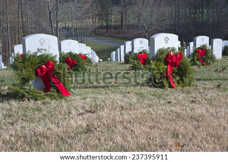 QUANTICO, VA-DEC 13, 2014: Quantico National Cemetery wreath laying event on Dec 13 Wreaths Across America , a non profit organization,  placed wreaths after a brief ceremony.