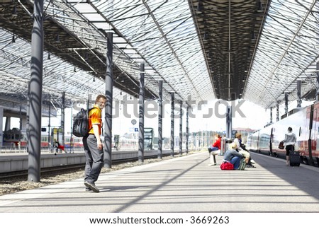 Man waiting in train station