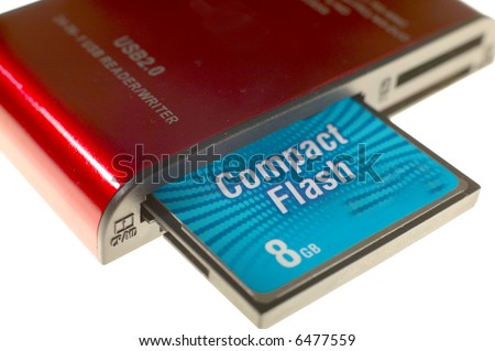 Compact flash card reader with 8 GB card, isolated on white background