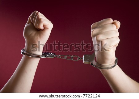 Man handcuffed hands at the back, use it in security concepts