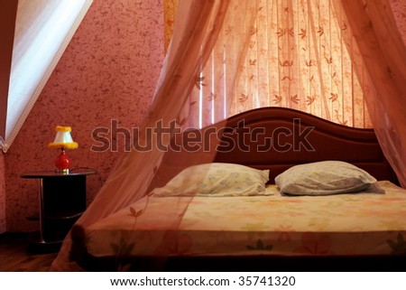 romantic bed with curtains