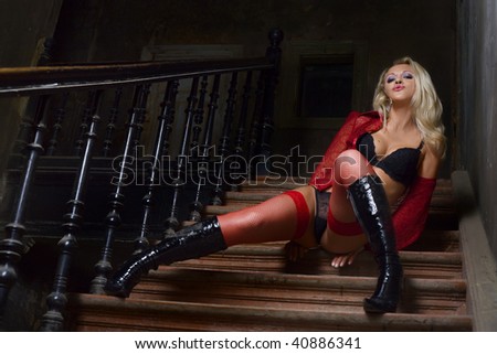 Sexual blonde in an old Europe house