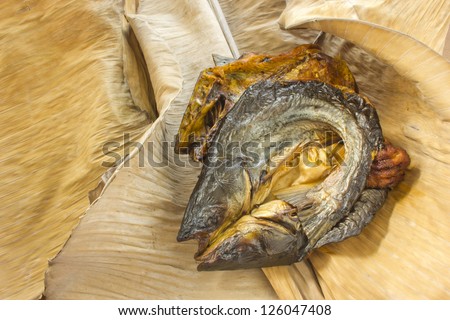 closeup dry fish on dry banana leaf