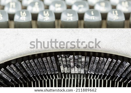 Close up of the letters on an vintage typewriter.