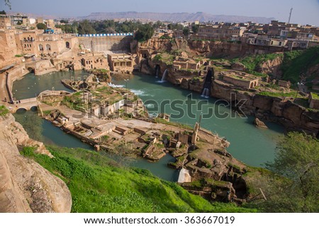 Shushtar is an ancient fortress city. Much of its past agricultural productivity derives from the Roman-built irrigation system which centered on the Band-e Kaisar, the first dam bridge in Iran.
