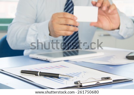 Businessman ready to exchange business cards
