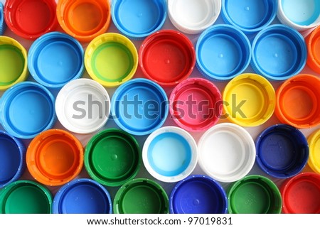 a lot of plastic bottle caps