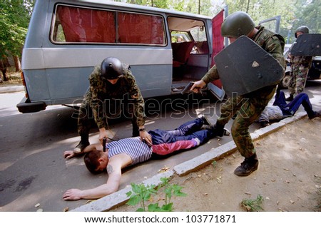 MOSCOW - AUGUST 8: Policemen with the organized crime task force train to arrest a suspected Chechen mafia car thief in Moscow, Russia, on Tuesday, August 8, 2000.