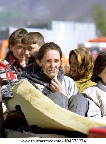 KUKES, ALBANIA, 17 APRIL 1999 - An ethnic Albanian family arrives at a refugee camp along the Kosovo border. The family had been driven from their home in Western Kosovo by Serbian security forces.
