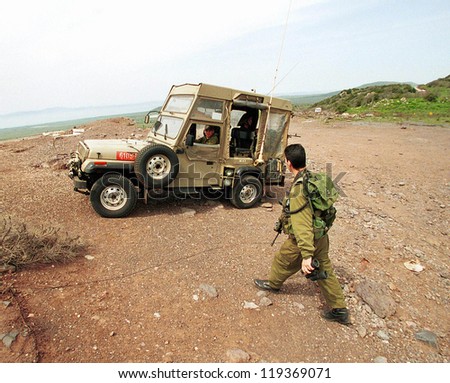 HAR VARDA, ISRAEL - MARCH 30:  Israeli Defense Force (IDF) soldiers patrol the Israeli Syrian border along the northern Golan Heights on March 30, 2000 in Har Varada, Israel.