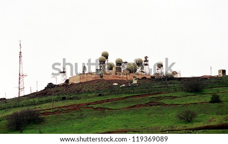 NEVE ATIV, GOLAN HEIGHTS - MARCH 30: An Israeli army early warning station high atop Mount Avital in the Golan Heights faces Syria on March 30, 2000 in Neve Ativ, Golan Height.