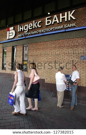 KIEV - JULY 12: Pedestrians walk by an Indexbank AS branch office in Kiev, Ukraine, on Wednesday, July 12, 2006.