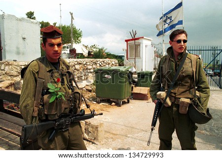 METULA, ISRAEL - MARCH 22: Israeli soldiers guard the border crossing  between Israel and Lebanon on March 22, 2000.