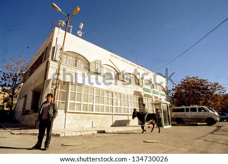 HEBRON - DECEMBER 17:  The controversial Gutnik Community Center in Hebron stands in front of the contested Tomb of the Patriarch on December 17,  1999.