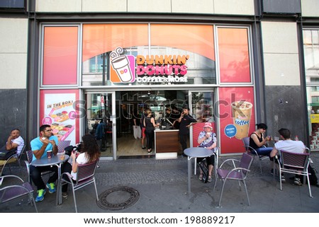 BERLIN, GERMANY - JUNE 11, 2014: A general view of a Dunkin\' Donuts coffee shop in  Berlin, Germany, on Saturday, June 11, 2014
