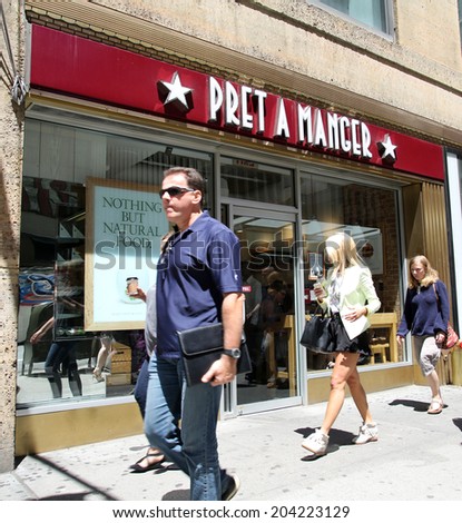 NEW YORK CITY - FRIDAY, JUNE 20, 2014:   Pedestrians walk past a Pret A Manger coffee and sandwich store in New York City on Friday, June 20, 2014.