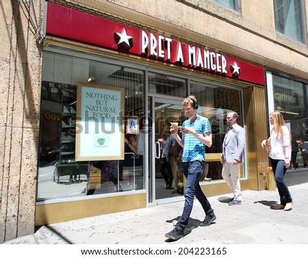 NEW YORK CITY - FRIDAY, JUNE 20, 2014:   Pedestrians walk past a Pret A Manger coffee and sandwich store in New York City on Friday, June 20, 2014.