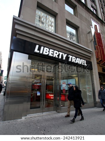 NEW YORK CITY - MONDAY, DEC. 29, 2014: Pedestrians walk past a Liberty Travel agent. Liberty Travel is an American retail travel and cruise company owned by Flight Centre Ltd.