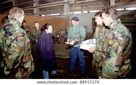 ZUNOVNICA,  BOSNIA, 12 DECEMBER 1997 - Former United States military officers, under contract from L-3 MPRI,  train Bosnian and Croatian  soldiers at a joint operations center in Bosnia.