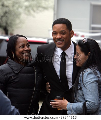 NEW YORK CITY - APRIL 15: Actor Will Smith greets fans on the set of 