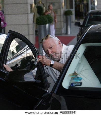 BUDAPEST, HUNGARY - SEPT 29: Hollywood movie producer Andy Vajna gets into his car outside a hotel in Budapest, Hungary, on Thursday,  September 29, 2011. Vajna produced such film classics as Rambo, Evita and The Terminator.