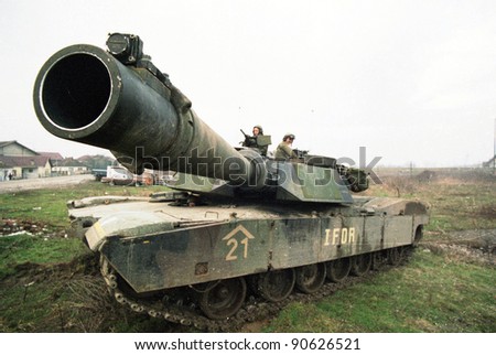 ZUPANIA, BOSNIA - JAN 22: An United States Army M1A1 tank on patrol near Zupanja, Bosnia, on Sunday, January 22, 1995.  The tank and its crew are in Bosnia as part of NATO\'s IFOR mission.
