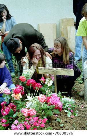 SARAJEVO, BOSNIA - MAY 26: A funeral for a Bosnian Croat shot down in the besieged capital of Sarajevo on May 26, 1993 in Sarajevo, Bosnia..