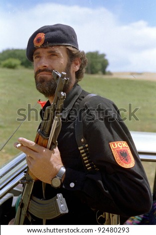 DRENICA, KOSOVO - JULY 7:  A guerrilla with the Kosovo Liberation Army (KLA) at a checkpoint near the town of Sirbica on July 7, 1998 in Drenica, Kosovo