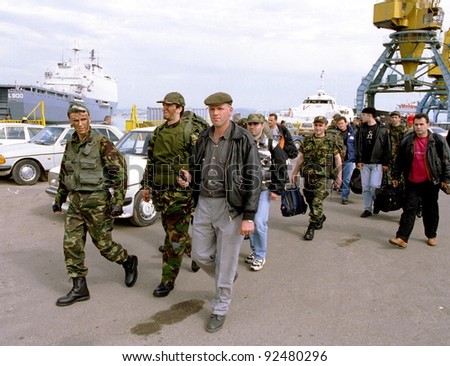 DURRES, ALBANIA - APRIL 22: Fresh Kosovo Liberation Army recruits arrive at the Albanian port of Durres from southeastern England on April 22, 1999 in Durres, Albania