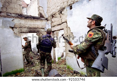 RETMILJE, KOSOVO,  07 NOVEMBER 1998 --- Soldiers of the Kosovo Liberation Army (KLA) on patrol  in the Drenica Triangle.  (C) Photo Credit: Mark H. Milstein/ Northfoto