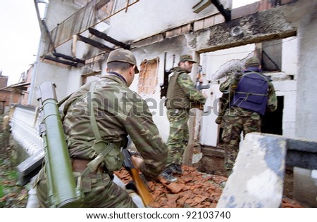 RETMILJE, KOSOVO,  07 NOVEMBER 1998 --- Soldiers of the Kosovo Liberation Army (KLA) on patrol  in the Drenica Triangle.  (C) Photo Credit: Mark H. Milstein/ Northfoto