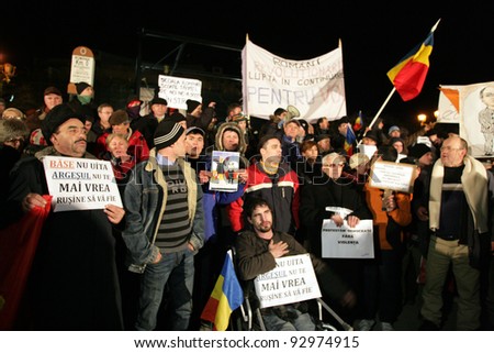BUCHAREST, ROMANIA - JAN 17: Thousands of demonstrators protest against a series of unpopular austerity measures enacted by the Romanian government in Bucharest, Romania, on Tuesday, January 17, 2012.