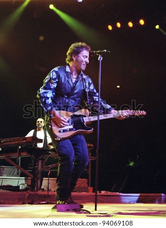 WASHINGTON D.C. – SEPT 21: New Jersey born rock star Bruce Springsteen performs a concert in Washington D.C. on Sept. 21, 1994.  (Quality Note: Grain)