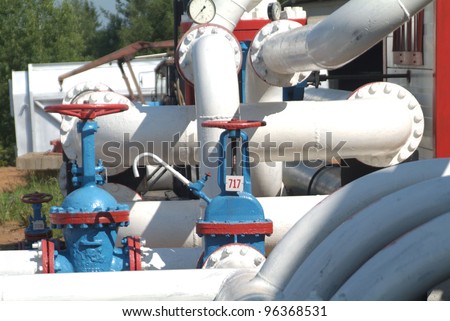 SOUTH CENTRAL RUSSIA - JULY 26: Storage tanks and transmission facilities at TNK-BP\'s Udmurtia oil fields on Tuesday, July 26, 2005 in south-central Russia
