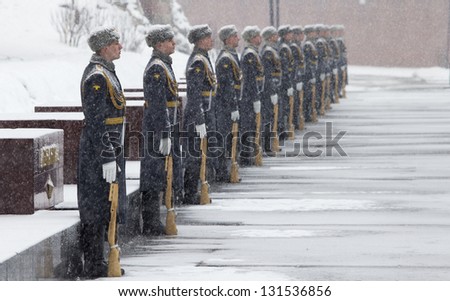 MOSCOW, RUSSIA - MARCH 14: Russian soldiers stand near the Kremlin wall during a snowfall, on March 04, 2013 in Moscow
