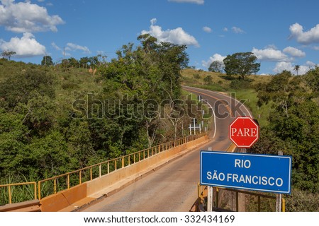 Transit Signs (Stop - San Francisco River) and Bridge over Sao Francisco River - One of the most important brazilian rivers