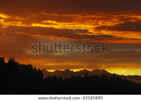 Stunning photo of Tatras mountains in Slovakia after the storm in the evening at dusk