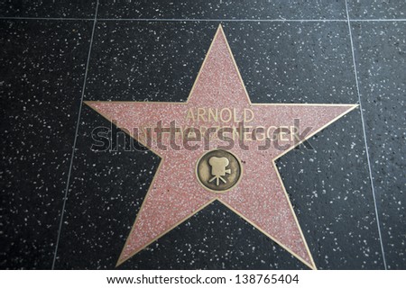 HOLLYWOOD, CALIFORNIA/USA - JULY 31: Hollywood Walk Of Fame Arnold Schwarzenegger star in Hollywood California in July 31, 2012. this is the famous street of the stars.