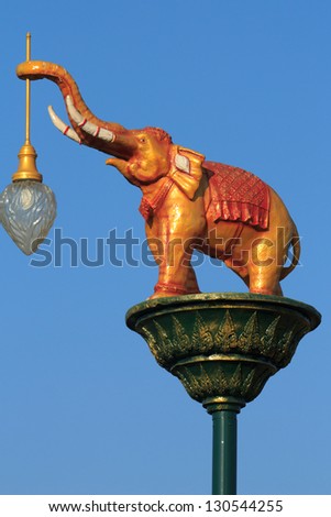 Street Lighting elephants against the backdrop of the sky.