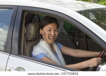Asian women drive more happily.