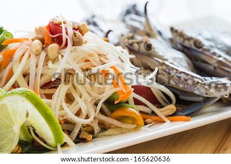 Crab salad served with a popular food.