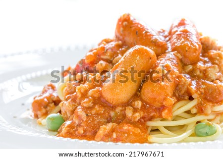 Close up spaghetti sauce sausage on white background