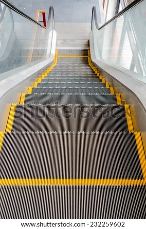 Moving escalator in shopping mall