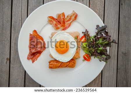 close up American style breakfast on wooden table