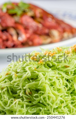close up green noodle and roast duck for chinese food
